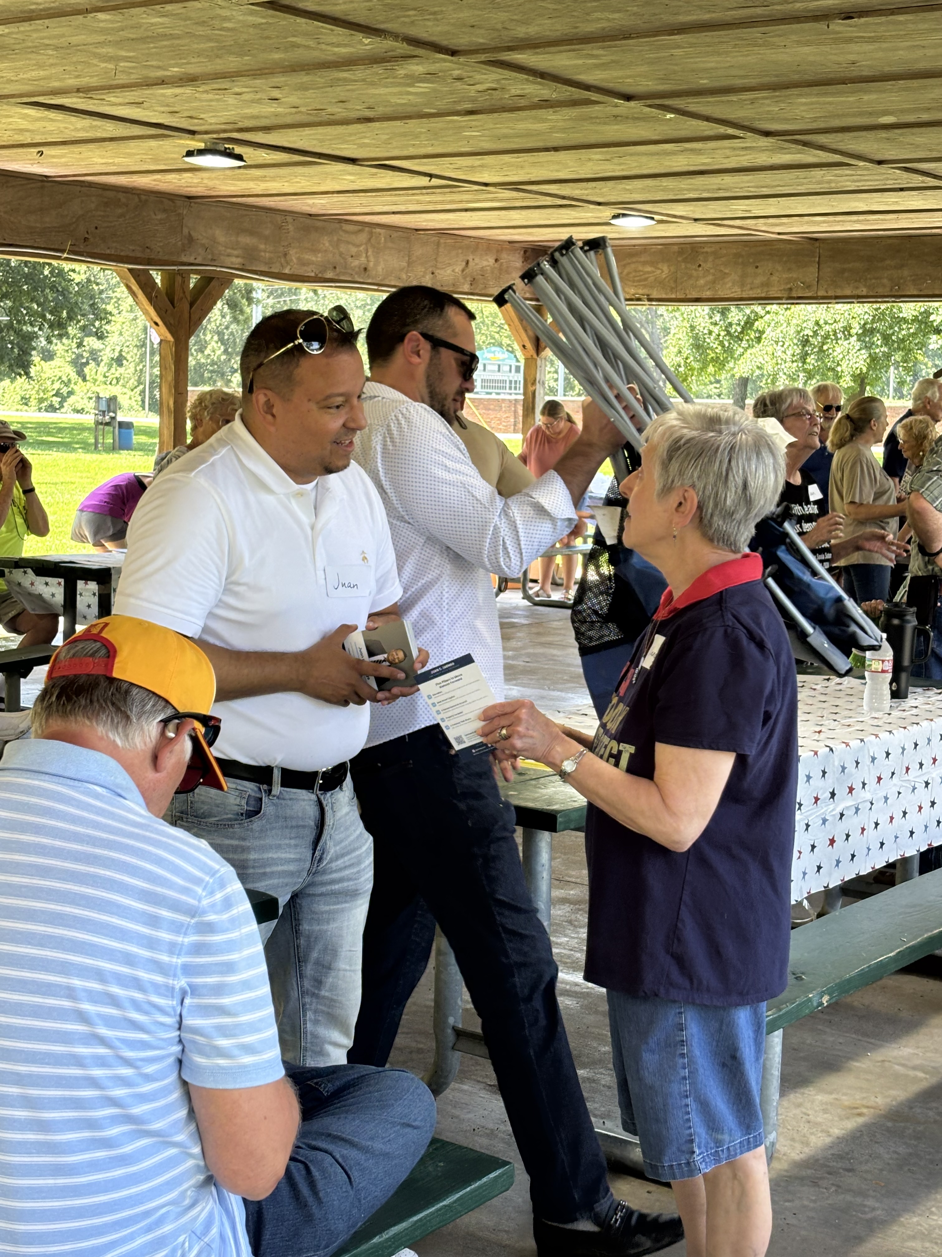 Juan speaking to a retired teacher and what matters most to her